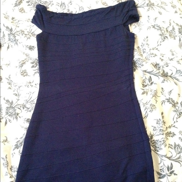 Blue off shoulder dress.