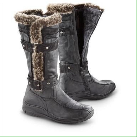Tall black boots with faux fur
