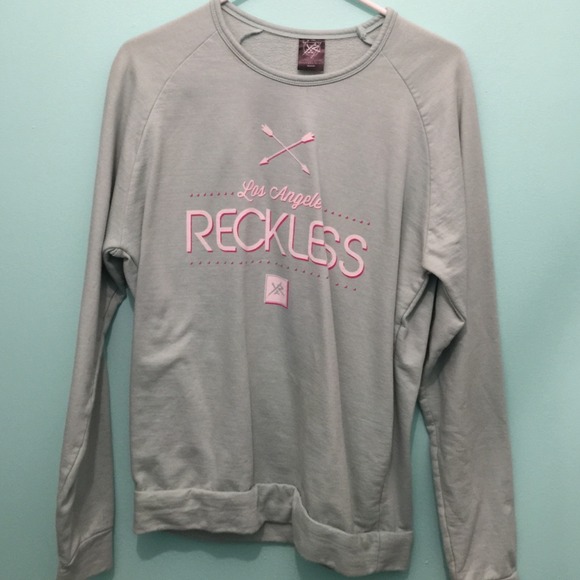 young and reckless sweater