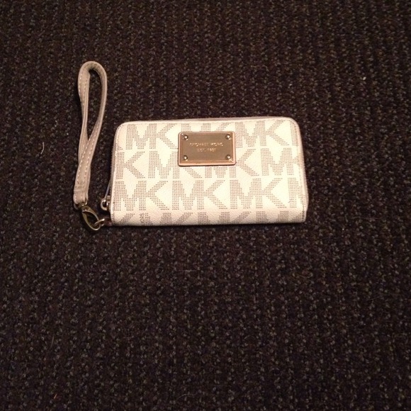 Authentic Michael Kors monogram wristlet wallet