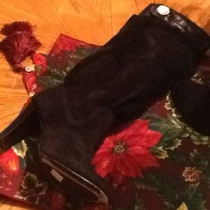 Michael Kors leather and suede slough boots.