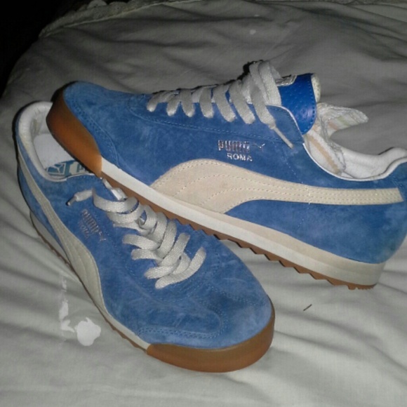 White and blue puma romas