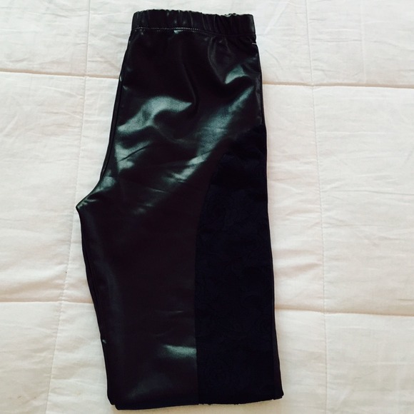 Liquid leather leggings with see through mesh.