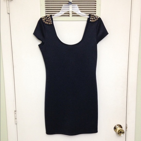 Short sleeve form fitting LBD w/studded detail