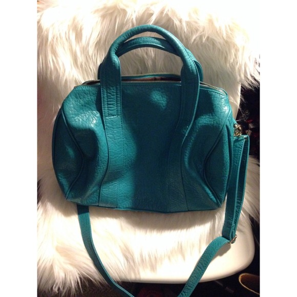 SOLD Kaitlyn Teal Leather Stud Duffle Bag