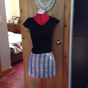 Silver sequin snake- skinned patterned mini skirt.
