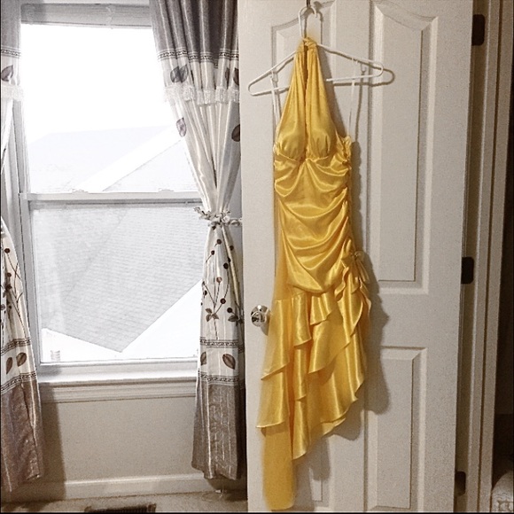 Yellow/gold prom dress with diamond detailing.