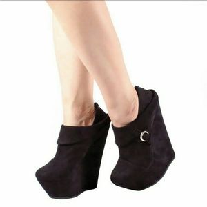 Black high wedge shoes