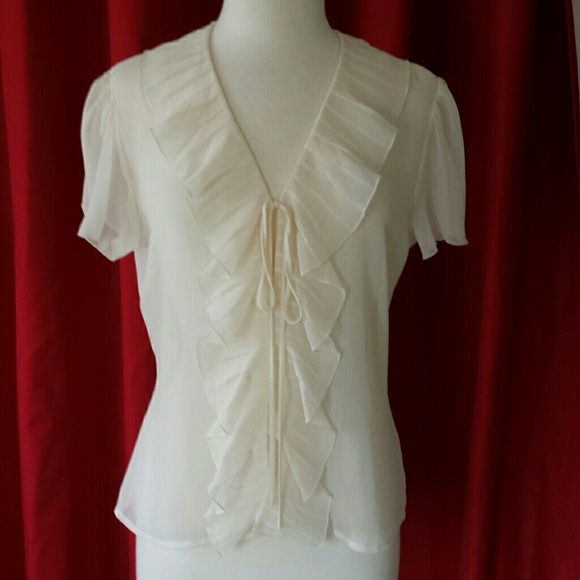 Sheer ruffle front blouse.