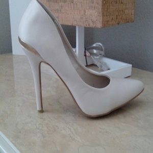 Nude with gold trim on heel, includes original box