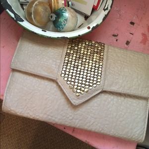 SOLD: gold studded clutch