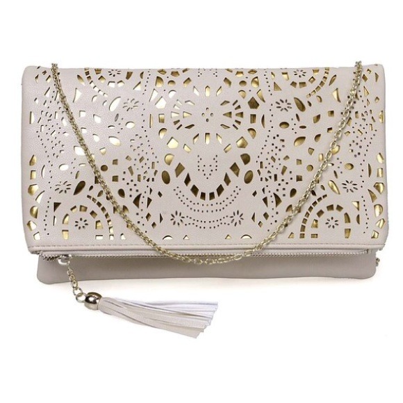NWOT Cutout gold accent clutch handbag.