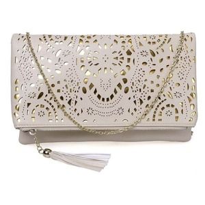 NWOT Cutout gold accent clutch handbag.