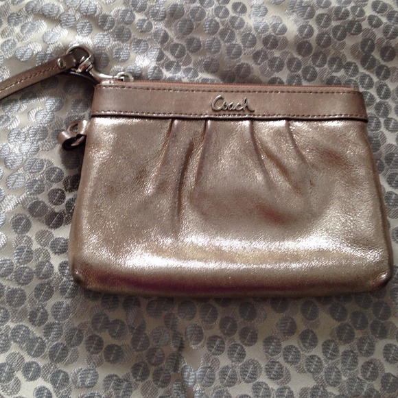 Gold coach wristlet