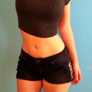 Black distressed studded shorts