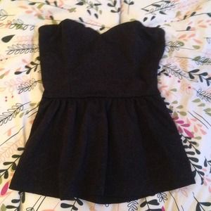 Black strapless peplum top