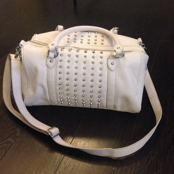 White faux leather bucket bag with studded detail
