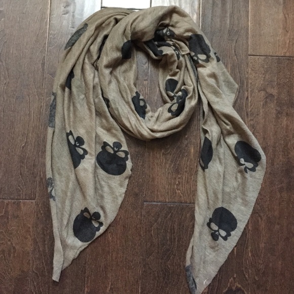 Tan scarf with black skulls