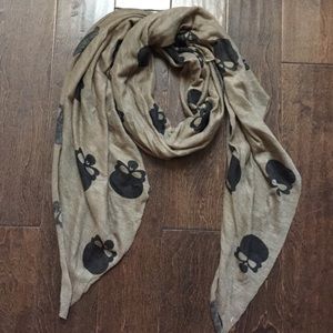Tan scarf with black skulls
