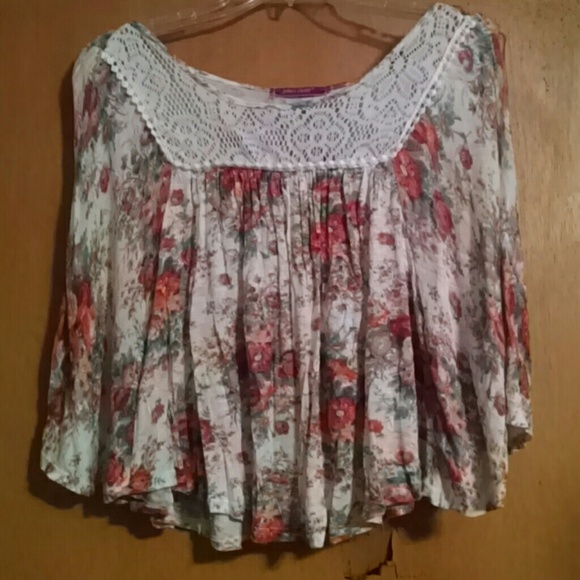 Cream top with with orange flowers