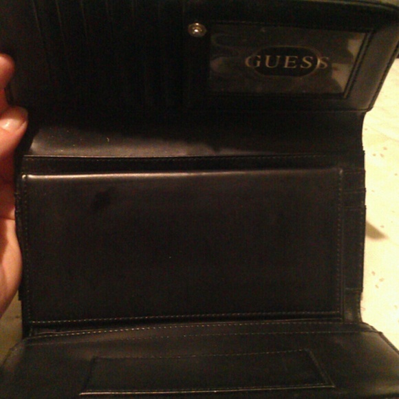 Guess black wallet. Gently used maybe a few times. - Picture 2 of 3