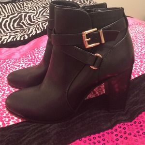 Cute ankle booties with gold buckle detailing
