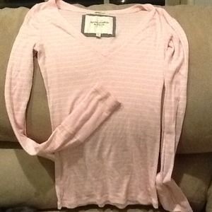 Pink and white striped, long sleeved shirt