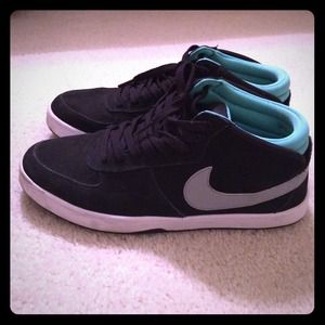 Black and teal Nike SB high tops.