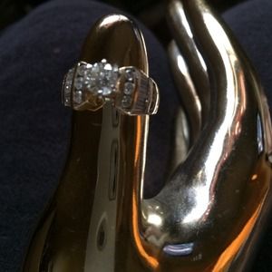 2 carat solitaire and baguette diamond ring. 14K