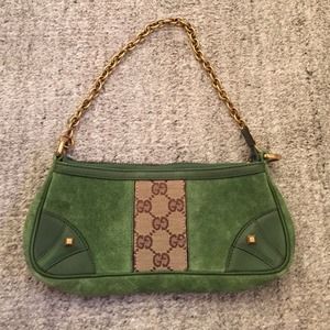 Small Green Gucci bag.