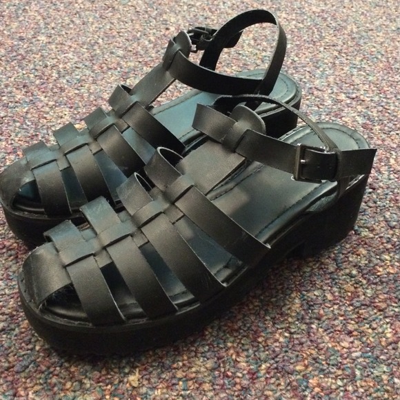 Black heeled platform shoe.