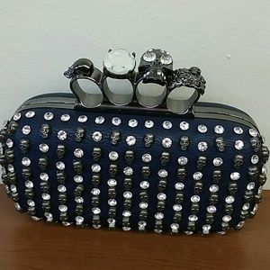 Diamond studded skull clutch