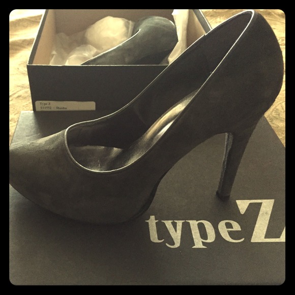 Gently worn gray suede shoes