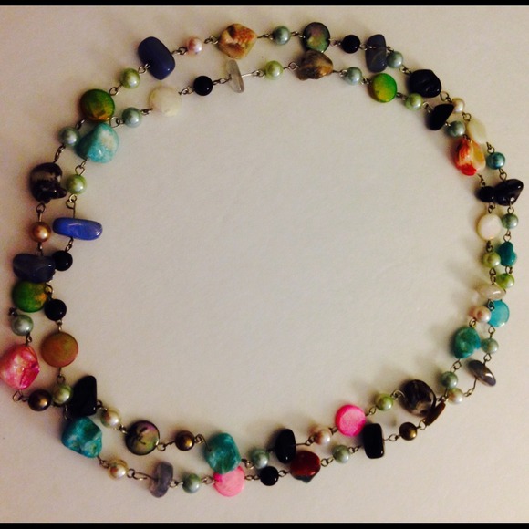 Long multicolored bead necklace can be doubled