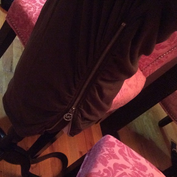 green long sleeved top with gorgeous MK detail