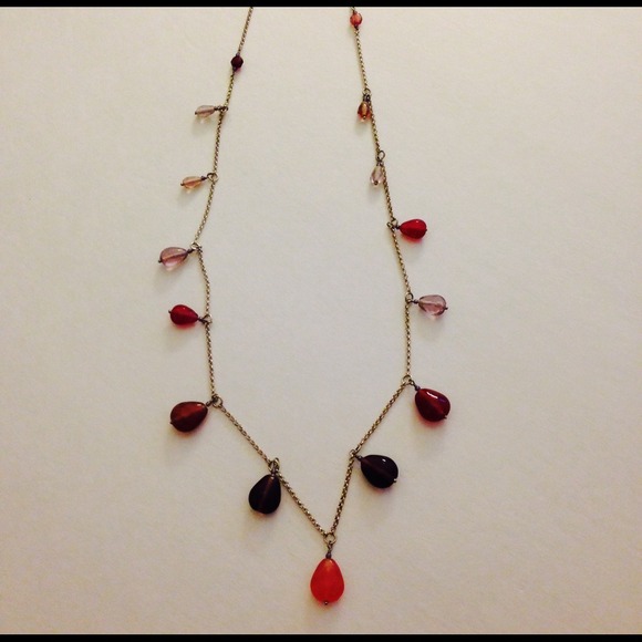 Pink and purple teardrop necklace on silver chain