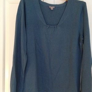 Look at this gorgeous peacock blue silk sweater!