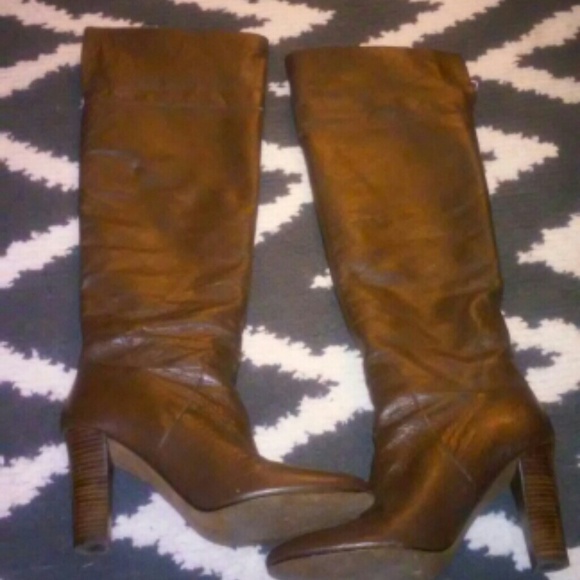 knee high brown boots, real leather upper.