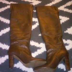 knee high brown boots, real leather upper.