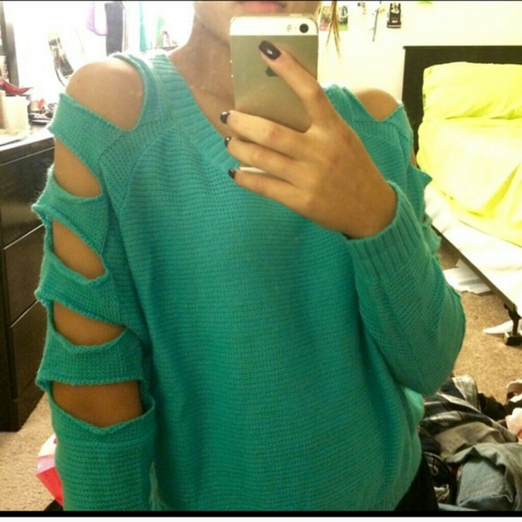 Sweater with cut outs
