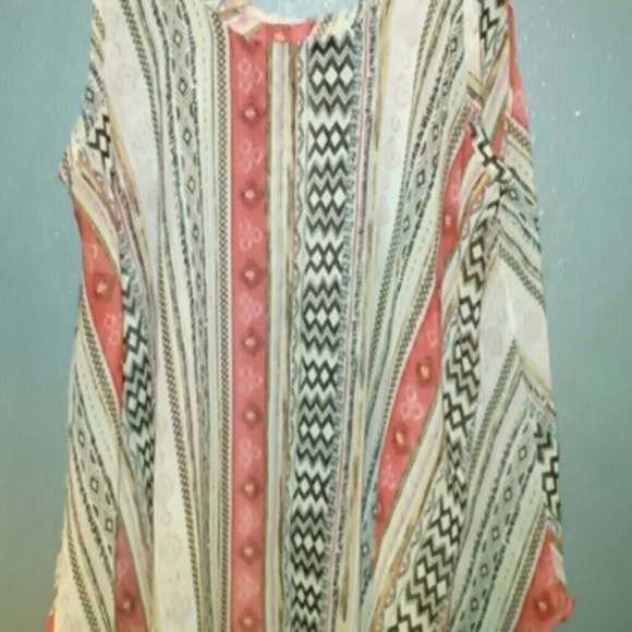 Brand new orange print top without tags. - Picture 2 of 3