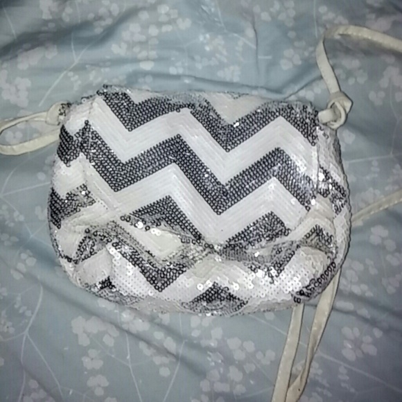 White clutch with silver glitter pattern