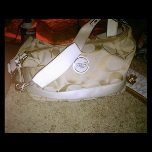 Stunning coach ivory luggage tote