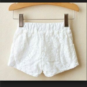 White lace shorts