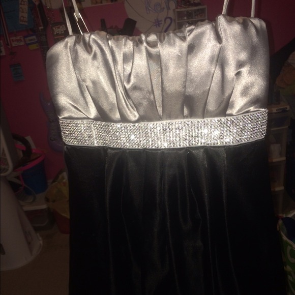 Cute short black dress.