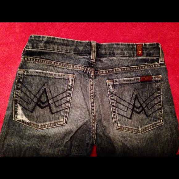 7 for all mankind distressed boot cut jeans