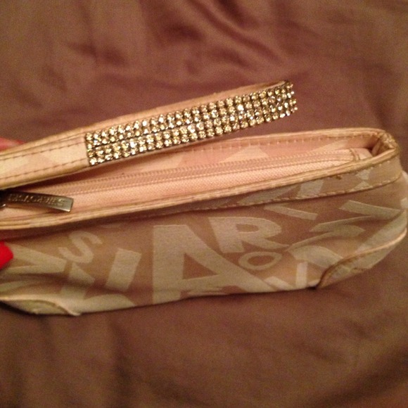 Swarovski Handbags - Swarovski light pink wristlet coin purse clutch