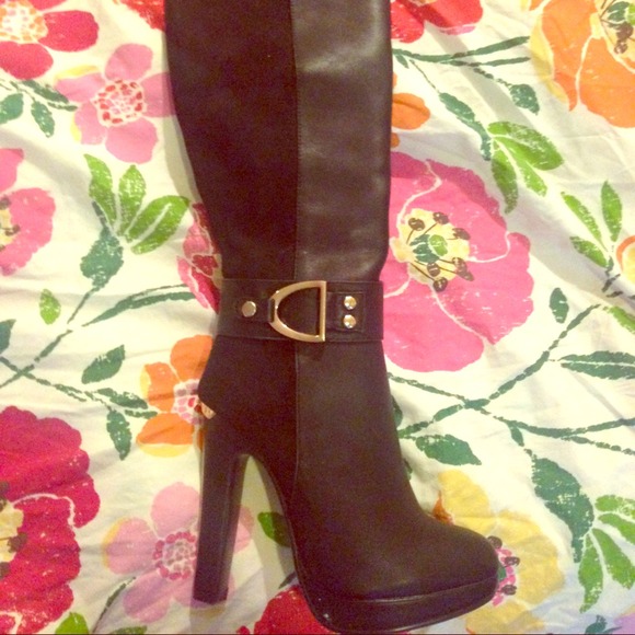 Tall black heeled boots