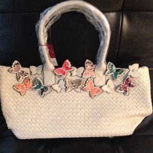 Off white purse with butterfly's