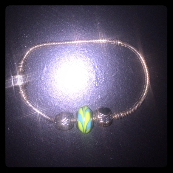 Silver pandora bracelet with three charms